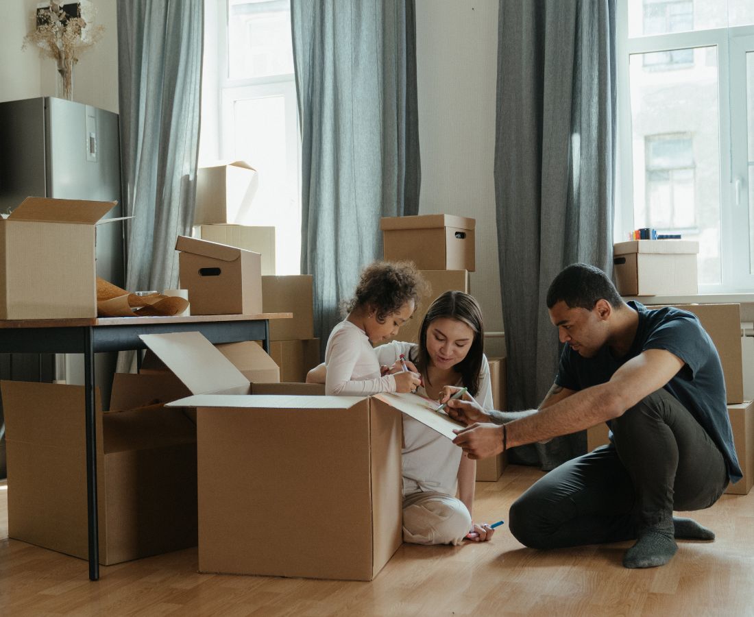 Florida family unpacking boxes in their new home